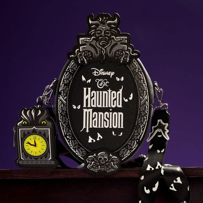 Loungefly- Disney
The Haunted Mansion Plaque Glow Crossbody Bag With Coin Bag - LeCharms & Co.